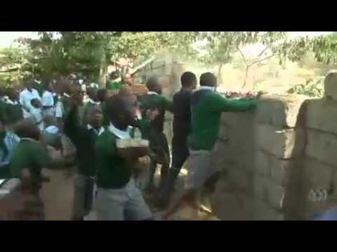 Video 2:00
         Kenyan police fire tear gas at children  s playground protest over alleged   la