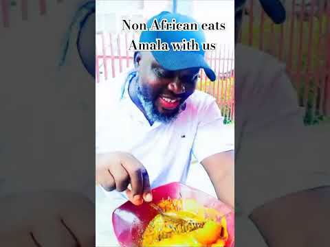 A non African Enjoys Amala with Africans #africanfood #food #amala #nigeria