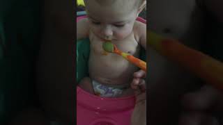 Baby hates peas so much, she throws up