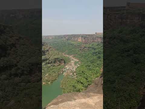 I am standing at the very edge of the Kyoti waterfall in Rewa, MP....