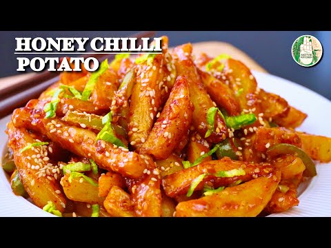 Honey Chilli Potato - Sweet and Spicy starter Honey chilli potato recipe - Sattvik Kitchen