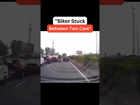 "Biker Trapped Between Two Cars! 🚨 Proof Ready with Woodman Dashcam – Don’t Miss It! 📹