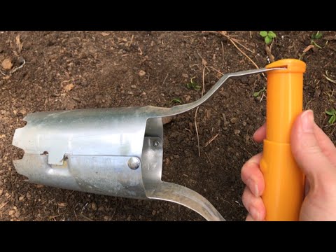 Using a Bulb Planter to Make Holes for the Garden