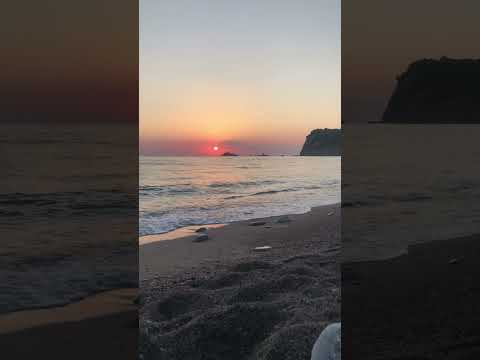 Beautiful sunset view at Buljarica beach in Montenegro filled with relaxing sounds of the sea.