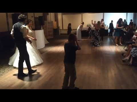 Wyatt flossing at Maddie & Tim's wedding