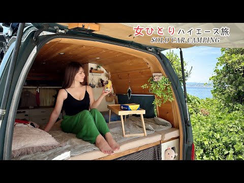 A small woman living in a big van eating delicious food in beautiful places. Homeless (carcamping)