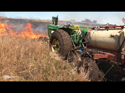 John Deere tractor STUCK in BURNING FIELD!