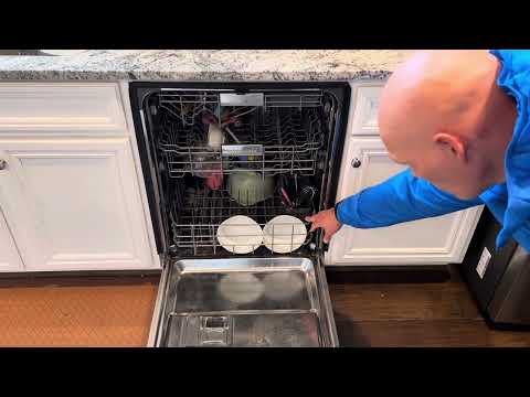 How to fix my dishwasher door. (KitchenAid dishwasher door spring repair)