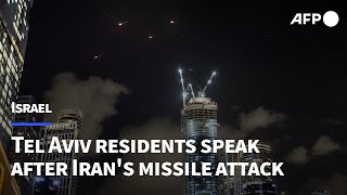 Israelis in Tel Aviv react to Iran's missile attack | AFP