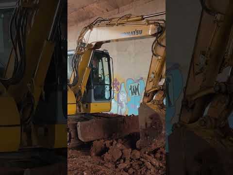 Komatsu PC78us Scraping Dirt