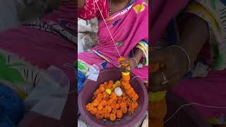 🌸💪 60-Year-Old Amma Crafting Beautiful Flower Garlands on the Road! | #Shorts