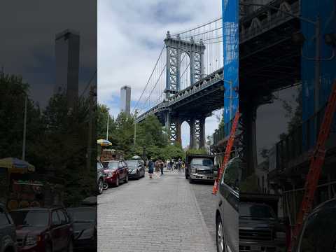 The DUMBO Manhattan Bridge View with the Empire State Building peeking out directly beneath it!