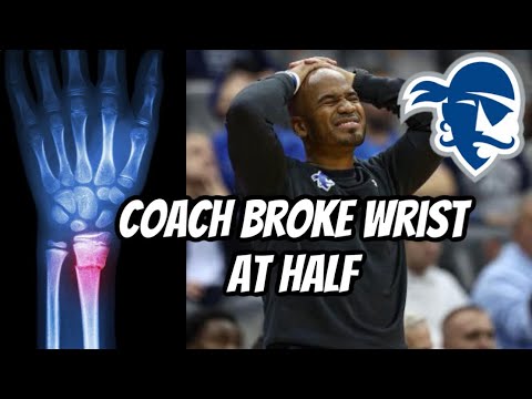 Seton Hall coach Shaheen Holloway broke his wrist at halftime of a basketball game, coached through