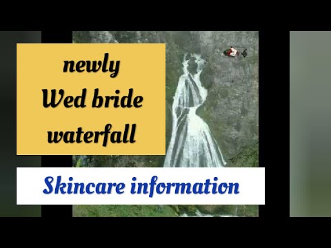 Newly Wed bride waterfall