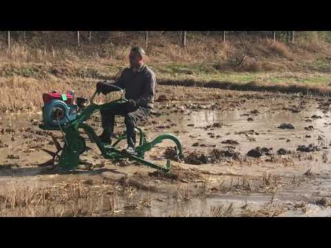 New paddy field tillage machine in operation