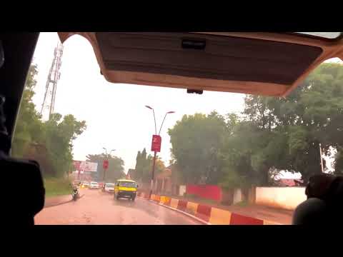 Lubumbashi: Public transportation on a rainy day.