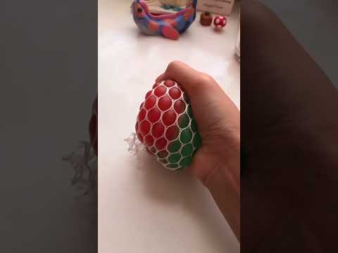 Squishing mesh squishy in slow motion #satisfying #slowmo #squishy