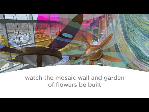 Mosaic wall and garden of flowers built in 30-second time lapse at Dayton Children's Hospital