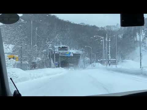 on the way to Hakodate Airport with  December blizzard and white-out in Winter , Hokkaido 2022