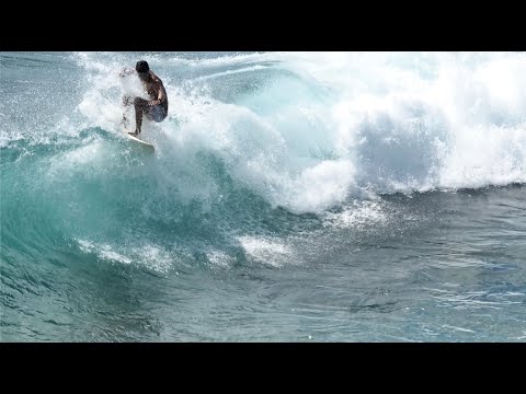 RIDING WAVES OVER SHALLOW REEF | DRONE FOOTAGE