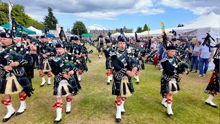 Lonach Pipe Band march off playing Pibroch o Donal Dhu at 2024 Aboyne Highland Games in Scotland