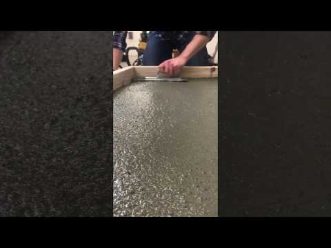 Easy troweled self-leveling lightweight high strength concrete underlayment