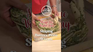 “Twist, braid, and shape! Watch the magic of our Buttery Pesto Wreath come to life! 🌿🥖