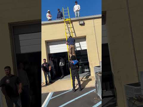 Students learn ladder safety. Part 3