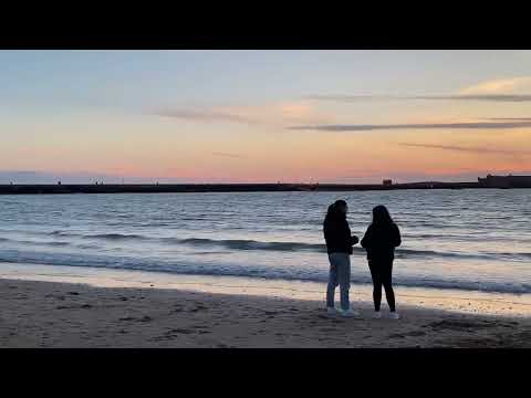 Sunset At La Celeta Beach, Cadiz.  A Popular Beach To Spend Time Watching Sunset