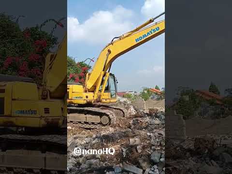 komatsu pc200 on a toll road early construction