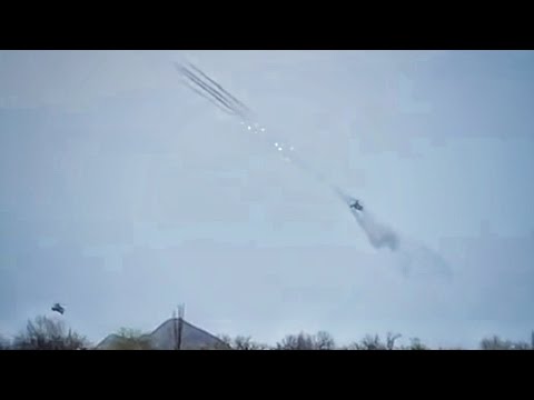 Russian Ka-52 Alligator and Mi-28N Havoc Attack Helicopters firing Rockets in Donbas.