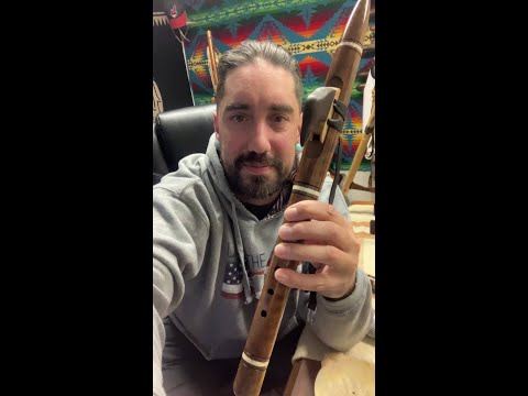 Native American style flute with Raven totem in the key of B flat made by Rising Moon Flutes