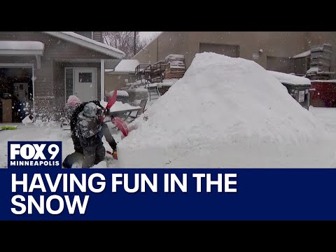 Snowstorm fun: Kids make the most of the MN snowfall