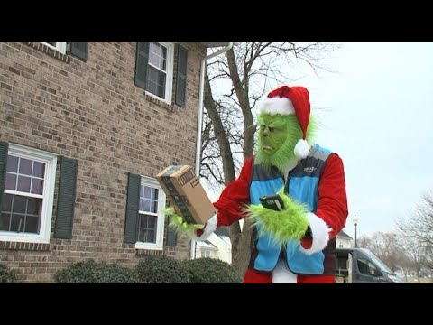 Amazon driver delivers packages dressed as the Grinch