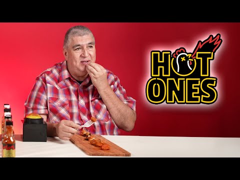 Mexican Dad Takes on the HOTTEST Wing Challenge