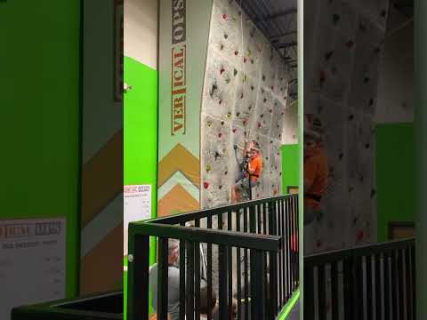 Climbing rock wall! Almost made it! Try again next time! Trampoline park 🙌