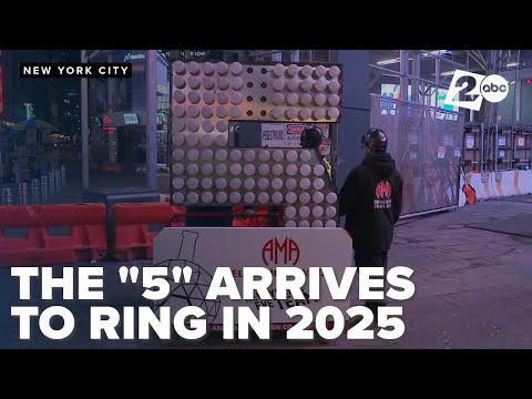 The "5" in the 2025 sign arrives at Times Square to be hoisted into place to countdown the new year