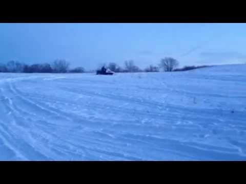 Boy Wonder Riding a Snowmobile For The First Time!