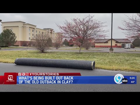 What's being built out back of the old Outback in Clay?