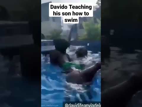 Davido teaching his son how to swim