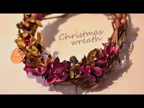 Handmade Christmas wreath with vines collected in the mountains