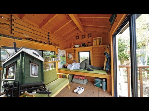 A log house in a trailer house. I came to visit the exhibition hall of BESS's house.