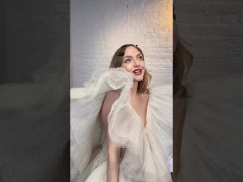 Amanda Seyfried giving us her best Glinda, Wicked!