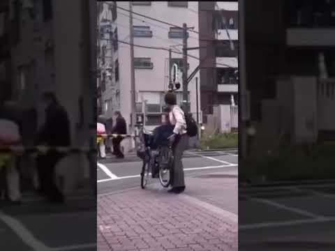 Heartwarming Moment: Strangers Help Elderly Man in Wheelchair at Train Crossing