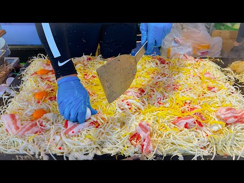 japanese street food - busy okonomiyaki stall お好み焼き