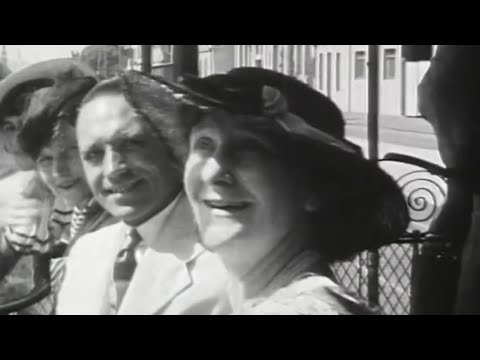 Jaunty music accompanies a tram ride through Melbourne.