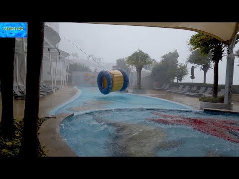 Rain Season Tropical Storm swimming pool at five star hotel Pattaya Thailand