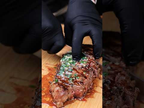 New York strip steak with garlic compound butter.