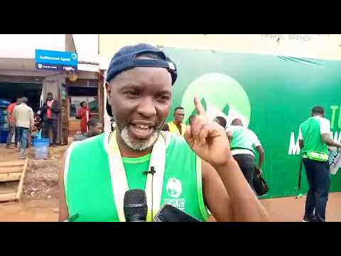 Amos Wekesa speaking at the Tusker Lite Mount Rwenzori marathon in Kasese