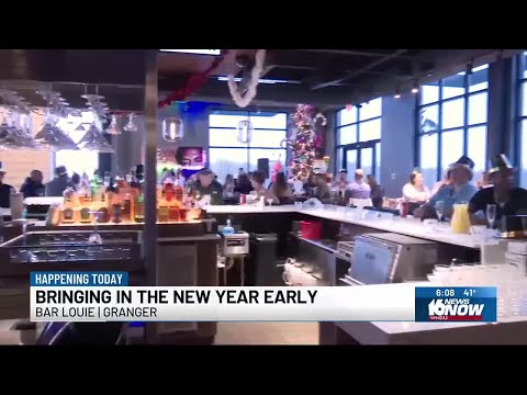 Bar Louie holds early New Year’s celebration